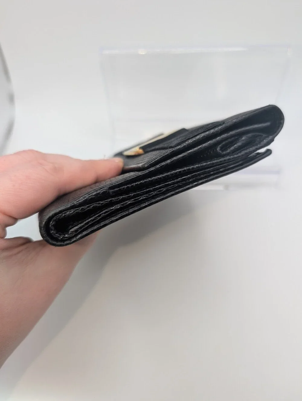 Salvatore Ferragamo Black Textured Vara Bow Wallet with Gold Hardware